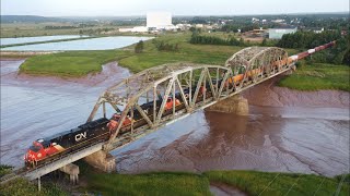 Awesome Aerial 4K View! Stack Train CN 122 Crossing Over Tantramar River at Sackville, NB
