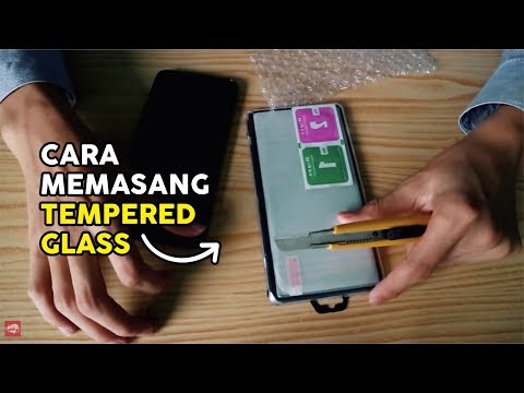 Video: Cara Menempelkan Kaca Pelindung Di Layar Smartphone