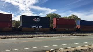 UP 3778 leads Eastbound Stack Train passes through Beaumont CA