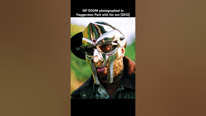 MF DOOM photographed in Haggerston Park with his son (2012) #mfdoom #rap #rapper