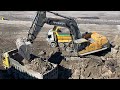 Volvo EC700C Excavator Loading Trucks