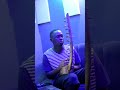 Playing Adungu African Instrument Harp