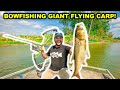 BOWFISHING Giant FLYING ASIAN Carp on the RIVER!!! (Catch Clean Cook)