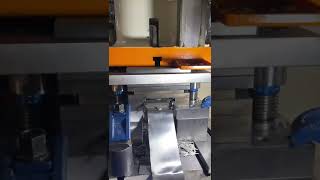 Stamping out the new tablet stand spring clip