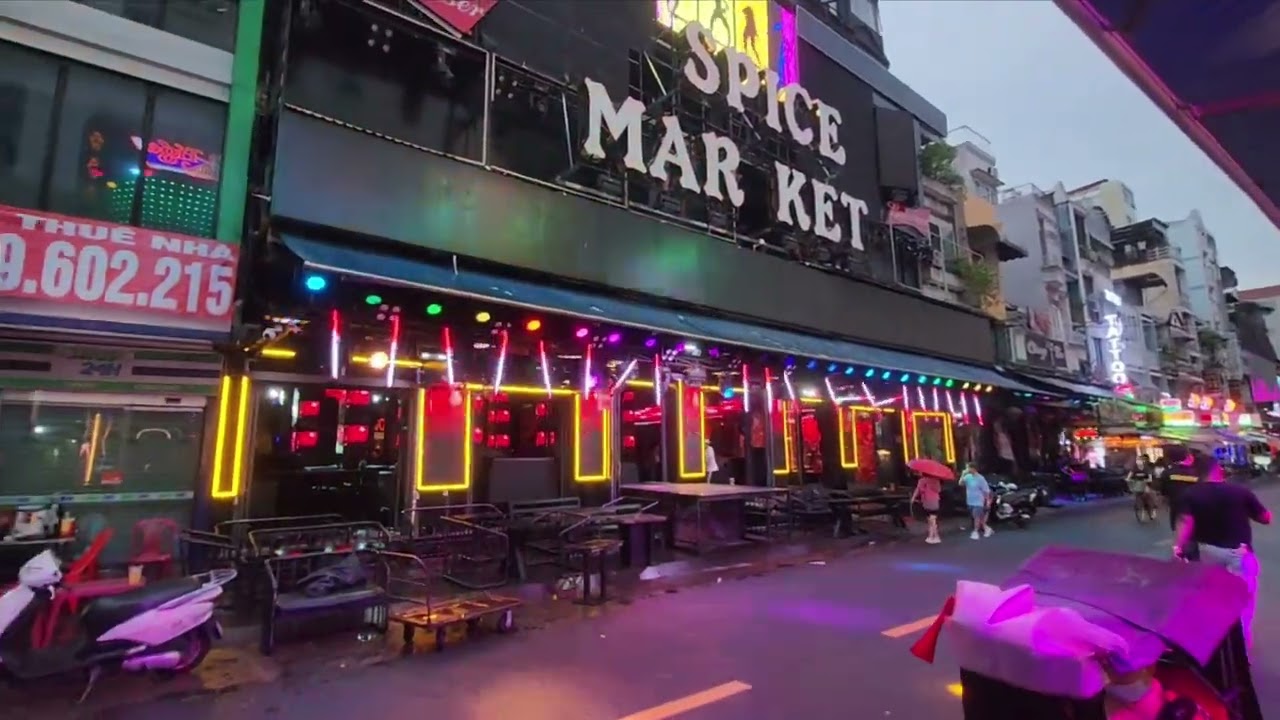 Night life, bar scene, street food, and Red-light district. Ho Chi Minh City. 
