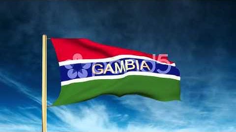 Gambia Flag Slider Style With Title. Waving In The Wind With Cloud Background