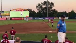 Mackenzie Gondek races Thunder mascot Boomer Thursday night