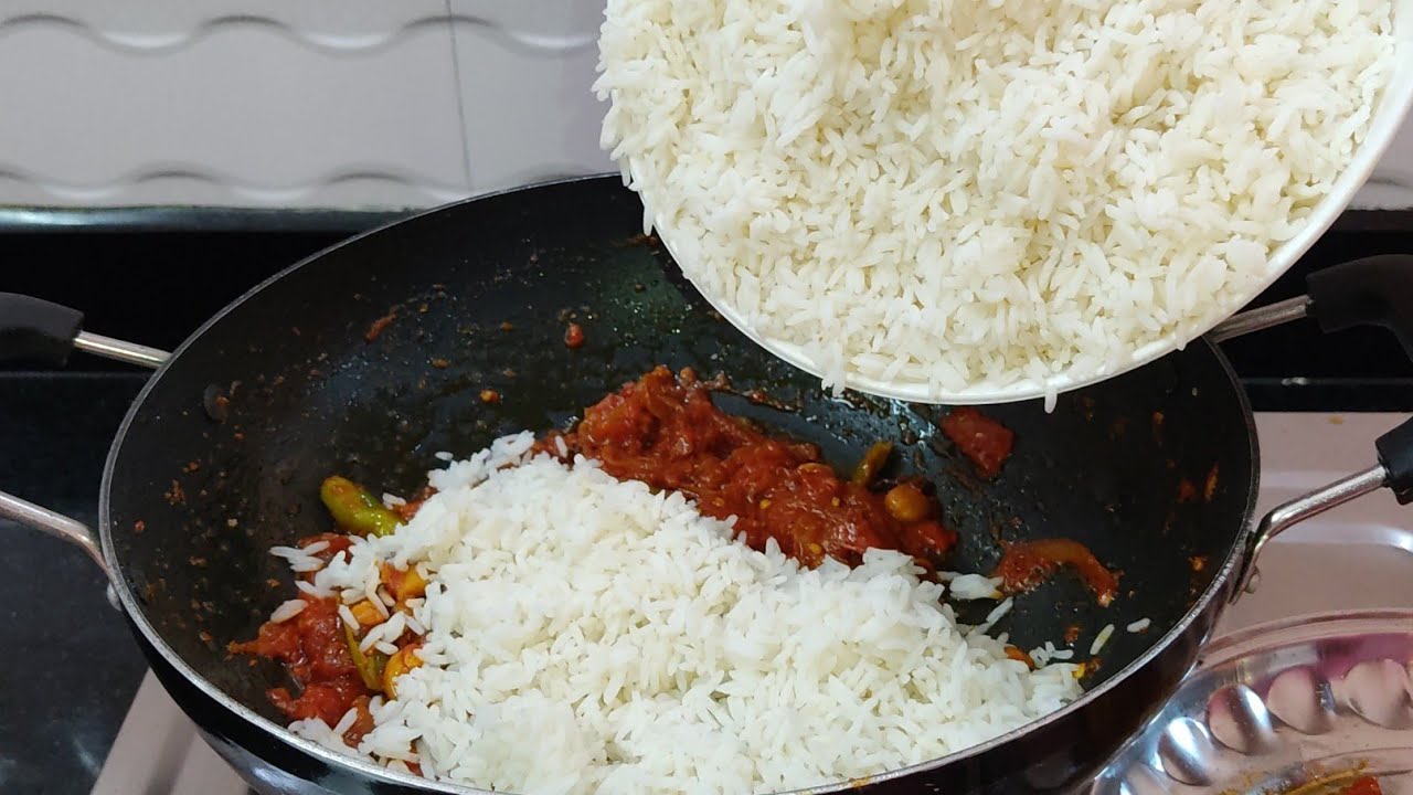 అప్పటికప్పుడు చాలా తక్కువ టైం లో ఈజీ గా చేసుకోగలిగే టమాటో రైస్ ని ఇలా చేసి చూడండి రుచిగా బాగుంటుంది