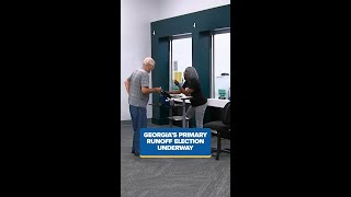 Georgia primary runoff election underway and Macon community mourning man killed in crash