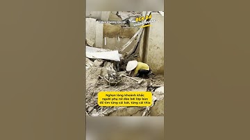 Nghẹn lòng khoảnh khắc người phụ nữ đào bới lớp bùn để tìm từng cái bát, từng cái thìa