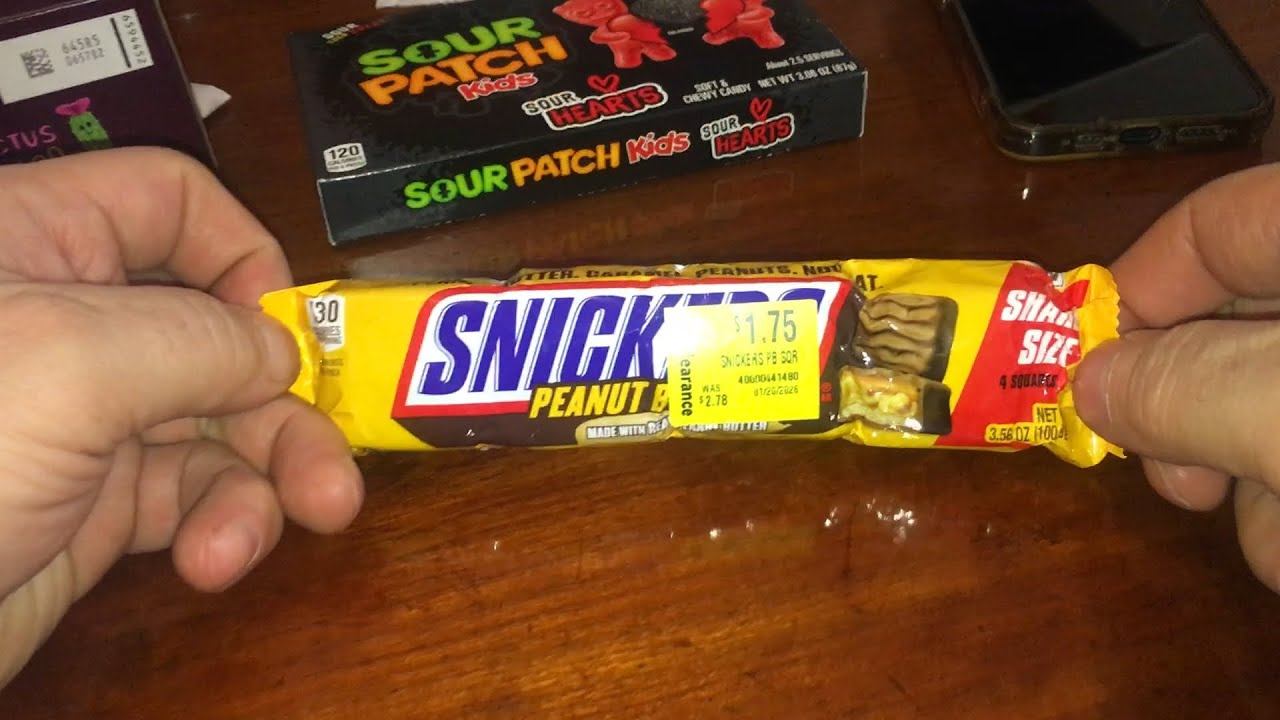 Давайте попробуем Snickers с арахисовым маслом в большой упаковке.