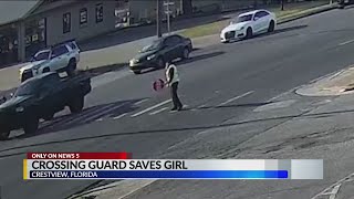 Crossing guard saves girl