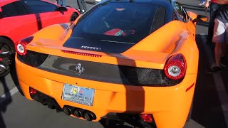 A unique orange ferrari 458 italia starting up and leaving lamborghini
newport beach's supercar show with two 430 scuderias. (november 2,
2013 / cost...