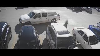 Video: Woman leaving bank approached by purse snatcher