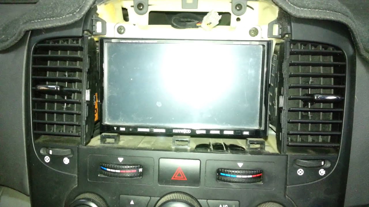 How to remove a radio from a Kia Carnival 2006 model - YouTube