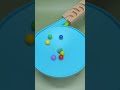 Colorful marbles are rolling into the hole. #satisfying