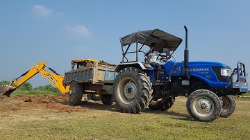 JCB Backhoe Machine Loading Mud on SONALIKA DI 47 RX Tractor-JCB Working For Road Constructions-JCB
