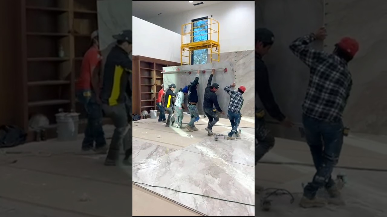 Ever wondered how these monster tiles are installed? Meet Volvy from Top Layer Tile Installation
