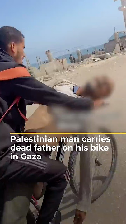 Palestinian man carries dead father on his bike in Gaza | AJ#shorts