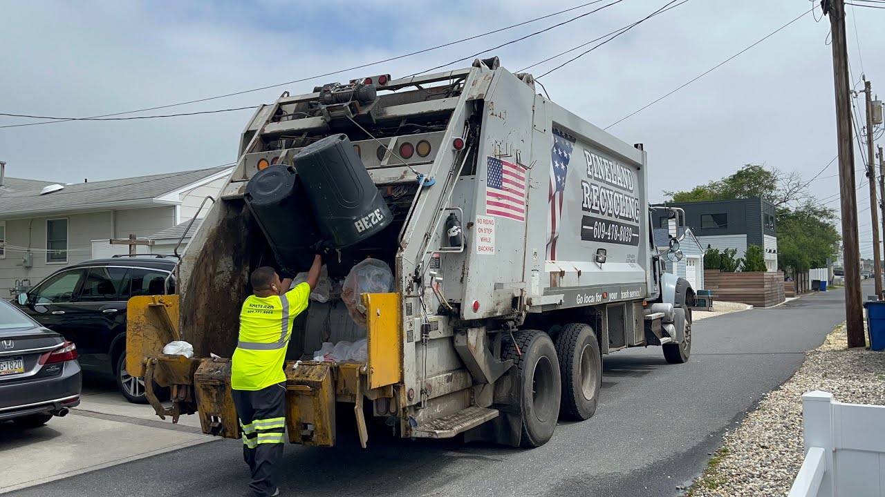 Pineland Recycling Mack Granite Heil 5000 rear loader garbage truck on