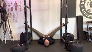 Supine straddle stretch with wall