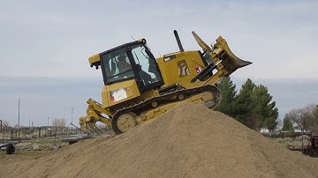 Dozer Over Hill by Operator Yang