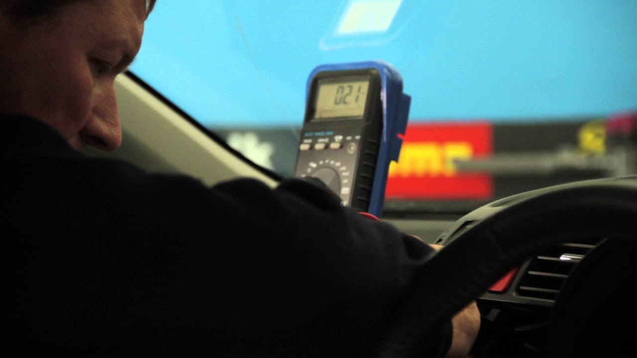 Toyota Corolla, after market head unit fitted with factory reverse camera integration