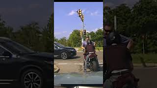 Motorcyclist pushes Massachusetts trooper into oncoming traffic