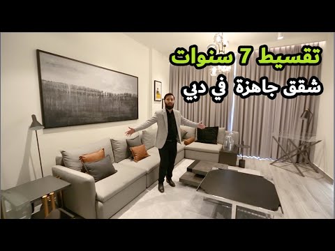 فيديو: الداخلية لقاعة 18 متر مربع في شقة - خيار الميزانية