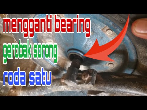 Video: Bagaimana anda meletakkan tayar kereta sorong pada pelek?