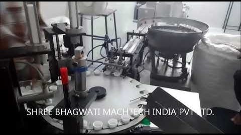 Cap Lining machine, Cap Wadding machine, MMC cap liner machine