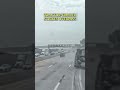 Dashcam video captures tractor-trailer striking overpass and overturning on Thruway in Nyack
