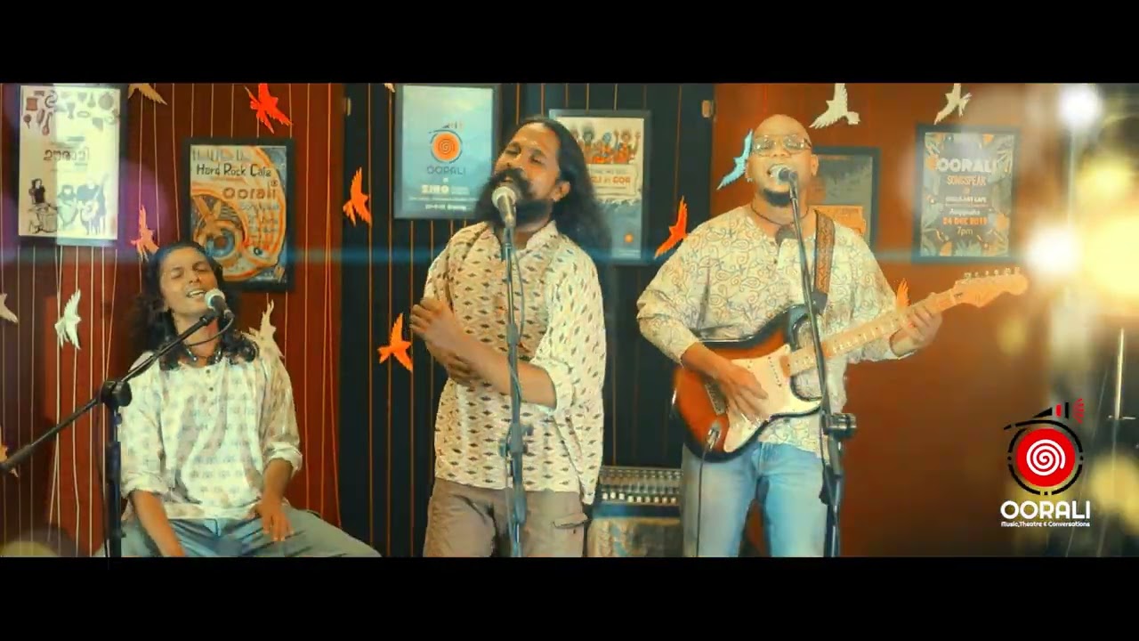 Mazha Paeyunnu Madhalam Kottunuu