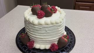 Cookies are where baking, art and creating come together. this is a
simple white cake with chocolate covered strawberries sugared
raspberries. perfect fo...