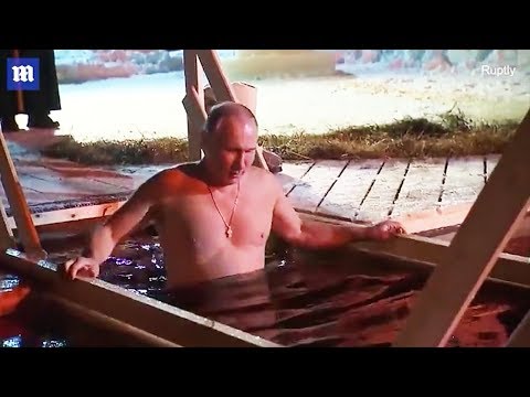 Vladimir Putin takes ice cold plunge for Epiphany ceremony