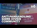 Anti-panhandling signs divide community