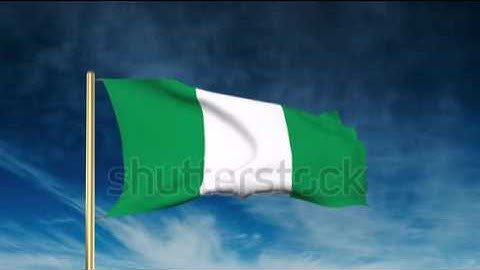 Nigeria flag slider style. Waving in the wind with cloud background animation Stock video by