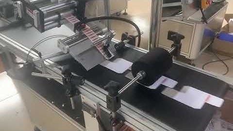 Small carton box cardboard paging feeding flat labeling machine labeling video