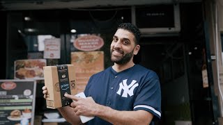 Watch how Amazon packages reach customers in New York City with the Hub Delivery program