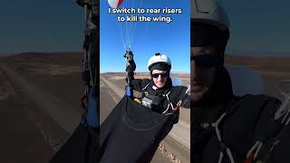 Windy landing on my paraglider in the desert