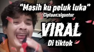 Download Lagu Masih ku peluk luka - siguntur (Viral di tiktok) MP3 Download Lagu Masih ku peluk luka - siguntur (Viral di tiktok) MP3