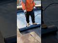Applying and Heating a Waterproof Roofing Membrane to Seal the Flat Roof Surface #shorts