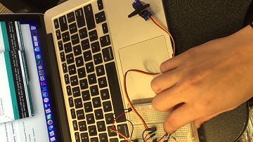 Servo Motor Controlled by a Pushbutton Momentary Switch