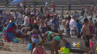 4th Of July Beach-Goers Celebrate With 'Heat, Meat, And The Beat'