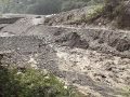 Overtopping failure of a large-scale artificial dam in Taiwan (Feng and Chen, 2012) - Part 2 Surge