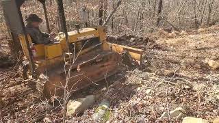 1010 gas John deere dozer at work