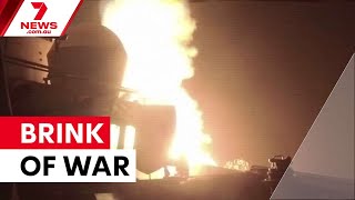 US and Iran exchange strikes as tensions escalate | 7NEWS