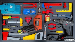 Collection of Repair Tools, Electric Drill, Electric Saw, Hammer With Wriench, Pliers, Hacksaw