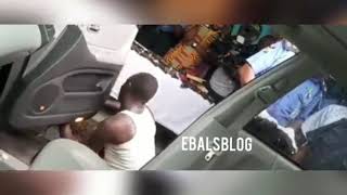 Policemen expose how guns and rifles are being hidden under dashboards in vehicles by armed bandits.