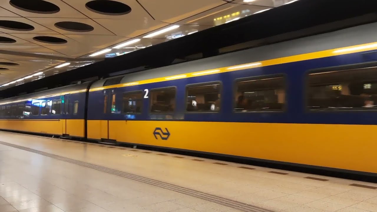 NS Intercity Materieel departing from Schiphol station